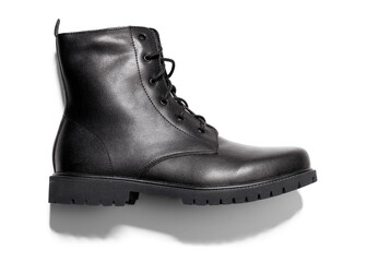 Black high-top hiking boots with lacing. Isolated on white background with shadow. Side view.