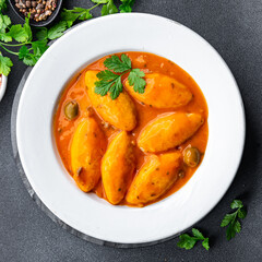 quenelle meat tomato sauce meal food snack on the table copy space food background rustic top view