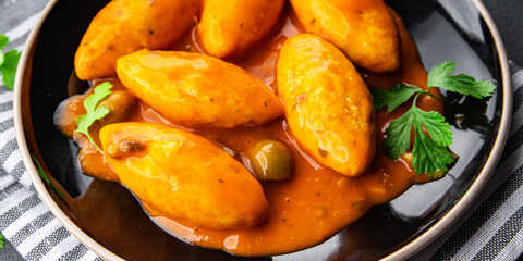 quenelle meat tomato sauce meal food snack on the table copy space food background rustic top view