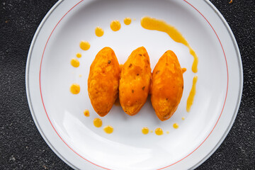 quenelle meat tomato sauce meal food snack on the table copy space food background rustic top view
