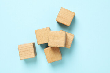 Blank wooden cubes for different concepts, top view