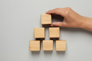 Blank wooden cubes for different concepts, top view