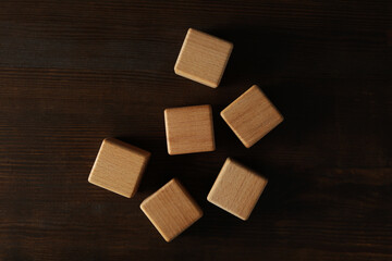 Blank wooden cubes for different concepts, top view