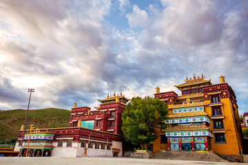 7th Dalai Lama's Birth Place at Litang Tibetan Town. a famous tourist spot in Litang, Ganzi, Sichuan, China. Dramatic sunset sky, copy space for text