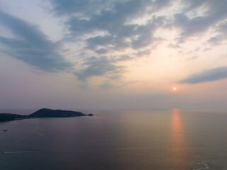 Fototapeta premium aerial panorama view beautiful sunset The beautiful sky reflects on the sea.scenery sunset at Patong Beach, Phuket used to be one of the top tourist destinations in the world..sky sunset background
