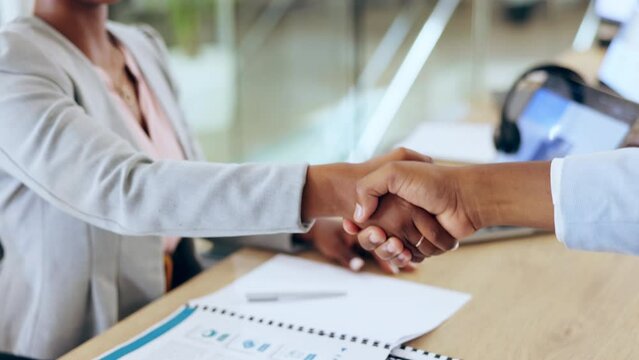 Handshake, meeting and interview with business people in the office for an agreement, deal or partnership. Collaboration, teamwork or contract with an employee and colleague shaking hands at work