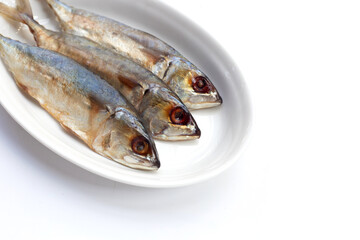 Salted fish on white background.