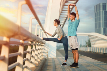 Young couples in the outdoor exercise
