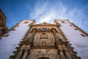Facade from below of the Iglesia de San Francisco Javier in the monumental historic center and World Heritage Site of C&aacute;ceres, Spain