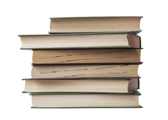 Books stacked vertically and horizontally. Fore edges. Isolated on a white background.
