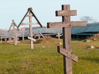An old Christian cemetery with wooden crosses. burials near the church. Kizhi Island, Karelia,...