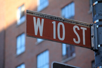 West 10th Street brown traffic sign in New York in Greenwich village historic district