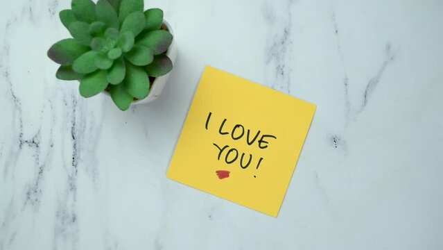 Concept of Man Sticking Love You Word Sticky