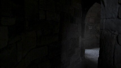 POV walking through stone day lit corridors in a medieval Castle