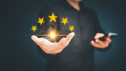 Customer or client man hand showing the stars icon to complete five stars. Assessment customer...