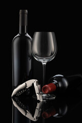 2 wine bottles and a wine glass with a modern corkscrew in front of a black background