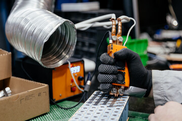  the process of manufacturing, mounting and soldering electrical elements for the creation of...
