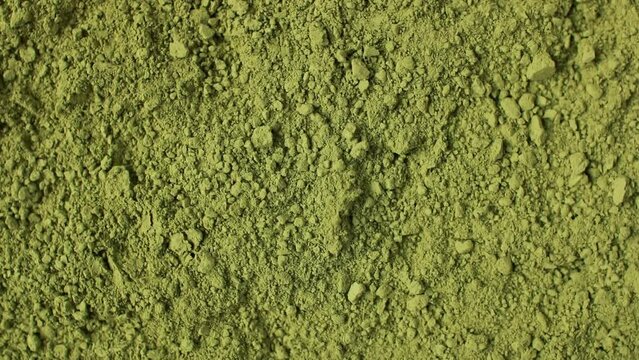Matcha powder green tea background rotation. Superfood. Healthy drinks. Top view.