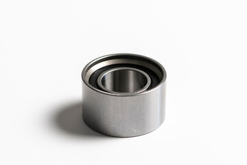 new car engine timing belt metal roller or pulleys isolated