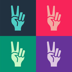 Fototapeta premium Pop art Hand showing two finger icon isolated on color background. Hand gesture V sign for victory or peace. Vector