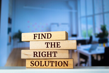 Wooden blocks with words 'Find The Right Solution'. Business concept