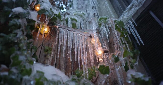 Low angle of melting icicles in spring