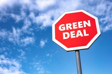 Stop sign with GREEN DEAL text to abandon controversial plan of EU to lower CO2 emissions