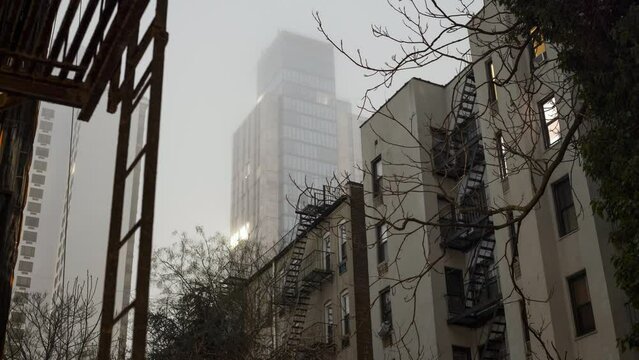Low angel of foggy covered building in NYC's upper east side