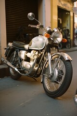 Fototapeta premium Silver motorbike in city street, created using generative ai technology
