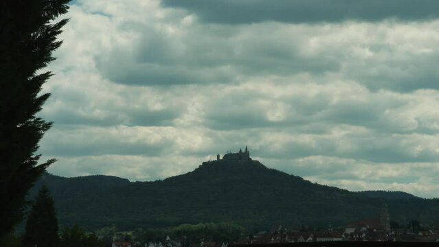 Time lapse of the Hohenzollern Castle under foggy clouds in Southwest Germany
