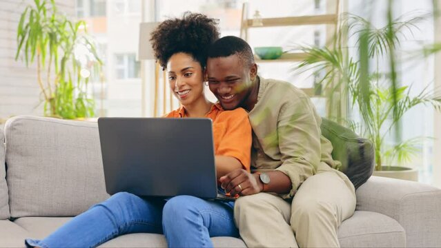 Laptop, couple and laughing in home living room, bonding and streaming funny comedy on sofa. Interracial, computer and happy black man and woman on social media, online browsing or scrolling for meme