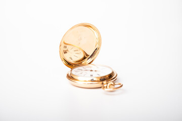 vintage gold pocket watch longines isolated on white background