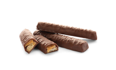 Sweet tasty chocolate bars with caramel on white background
