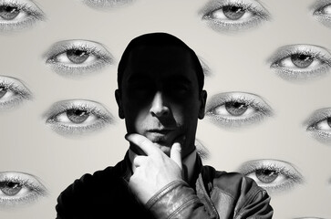 Collage art in surrealism style with a man on female eyes background