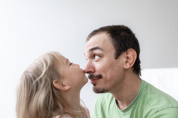 father and toddler daughter cheerful portreit, tenderness family relationship. . Fathers day 