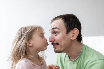 father and toddler daughter cheerful portreit, tenderness family relationship. . Fathers day 