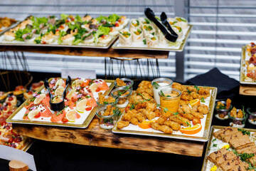 Assortment of snacks on the hotel buffet table.