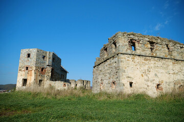 Fototapeta na wymiar Stone ruins in Pniv Castle - medieval historical object in western Ukraine