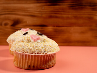 Muffin on a pink background. Delicious sweets. High quality photo