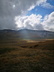 Vertical shot of a cloudy day at Campo Imperatore, Abruzzo, Italy