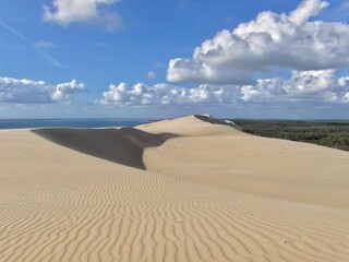 Scenic view of the Great Dune of Pilat against sky, Arcachon Basin, Nouvelle Aquitaine, France.