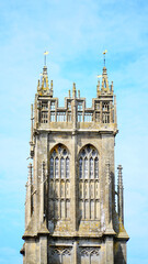 Fototapeta na wymiar Vertical shot of the Church of St John the Baptist in Glastonbury, Somerset, England