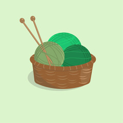 Wicker basket with balls of  green yarn and knitting needles. Cartoon vector illustration.