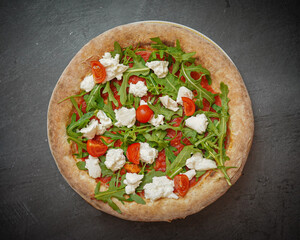 Fresh mozzarella tomato pizza, close-up, vibrant colors, basil garnish, homemade Italian cuisine,...