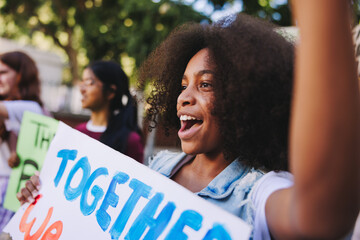 Diverse young people fighting to save the earth