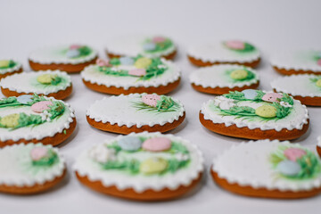 A table with decorated Easter cookies on it