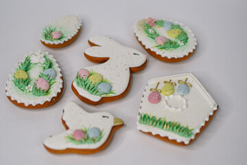 A table with decorated Easter cookies on it
