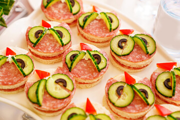 sandwiches with sausage and cucumber for children. children's holiday menu. 
