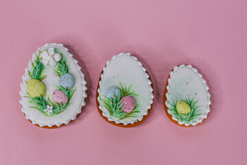 A table with cupcakes with the word Easter on it
