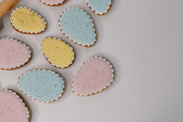 A table with cupcakes with the word Easter on it